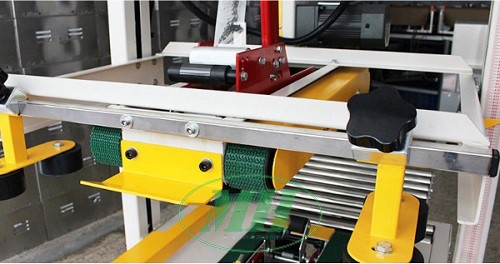 Máy dán băng dính thùng Carton